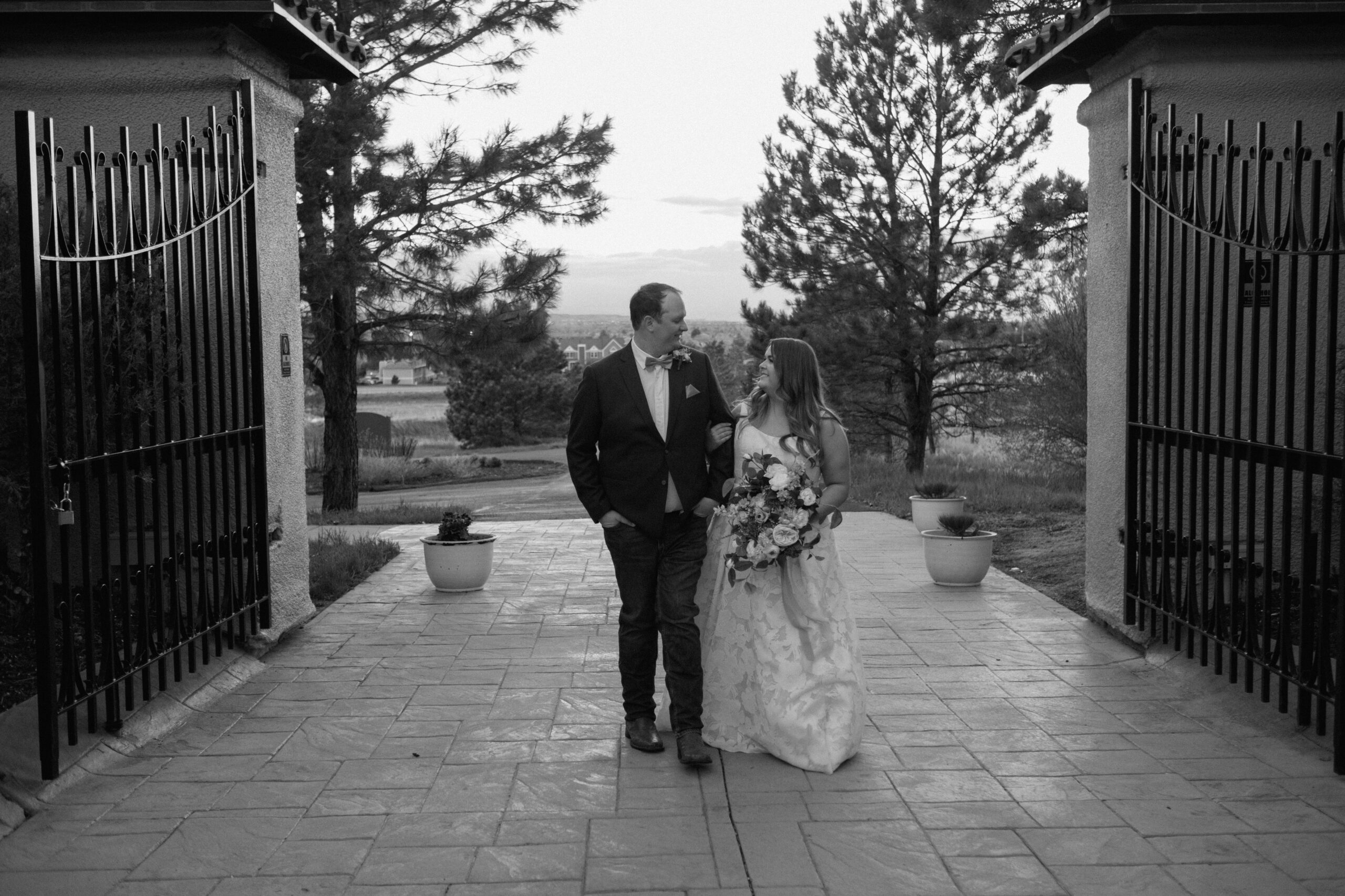 bride and groom walking together after ceremony at Villa Parker in Colorado